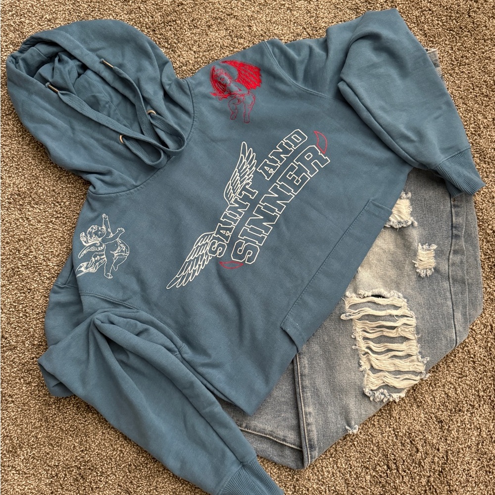 Blue Graphic Hoodie with Distressed Jeans